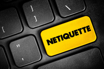 Netiquette is a set of rules that encourages appropriate and courteous online behavior, text concept button on keyboard