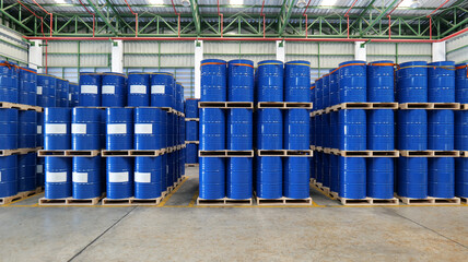 a blue barrel In the warehouse, 200-liter chemical barrels are arranged on wooden pallets and...