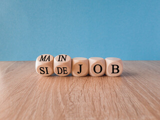 Extra or side job symbol. Turned wooden cubes and changed concept words Side job to Main job....