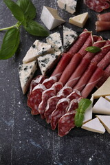 photo of sliced sausage and cheese assortment