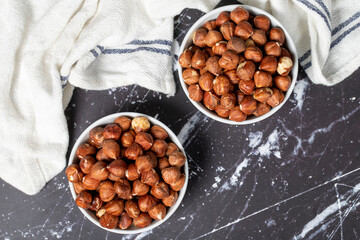 Hazelnut. Peeled hazelnuts in ceramic bowl. Superfood. Vegetarian Food concept. Healthy snacks. Top view