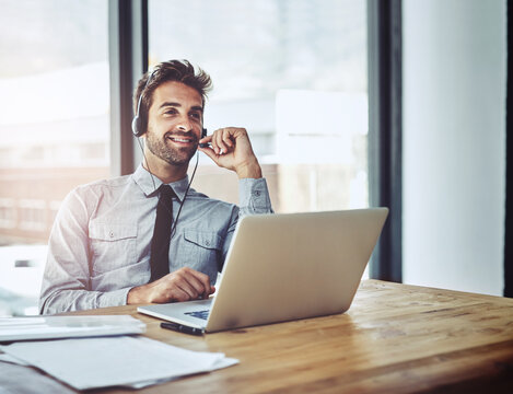 Happy businessman, laptop and call center for customer service, consulting or financial advice at office. Virtual assistant man person, consultant or agent talking on computer for online desk support