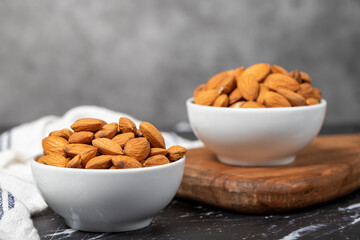 Almond. Almond in ceramic bowl. superfood. Vegetarian food concept. healthy snacks. Close up