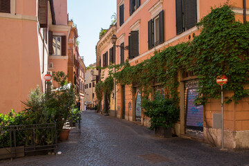 Fototapeta na wymiar A street in Trastevere district in Rome, Italy.