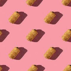 seamless pattern of wine corks on a pink background with hard light
