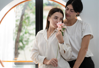 Romantic young couple in love happy romance relationship together. Portrait of handsome man...