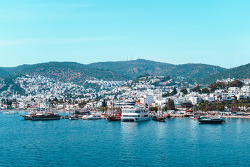 Fototapeta na wymiar Bodrum castle (saint Peter castle) and marina with boats view from above. sailing boats with blue sky and sea