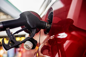 refuel the car with gasoline at the gas station. The economic crisis of petroleum products. from...