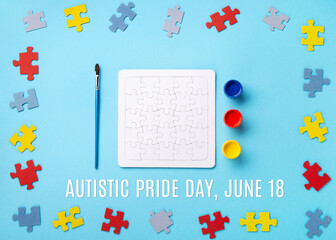 World Autism Awareness Day Card, colorful Puzzles on Blue Background.
