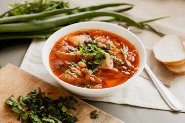 Borsch is a national Ukrainian dish. Serving dishes, kitchen utensils. Restaurant, lunch at home. Recipes for family