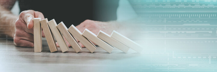 Concept of business control by stopping domino effect; panoramic banner