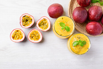 Fresh passion fruit smoothie drink in summer season, Table top view