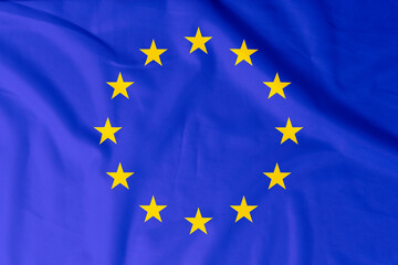 Flag of European Union with natural material creases as a background