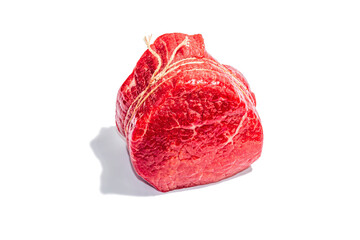 Raw Ribeye steak isolated on white background. Trendy hard light, dark shadow