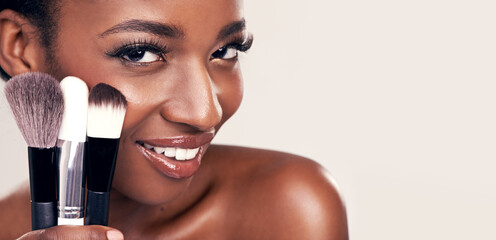 Cosmetics, makeup brushes and portrait of black woman in mockup space on studio with cosmetic application tools. Skincare, blush and beauty banner, luxury facial skin care model on white background.