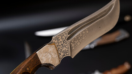 Damascus steel knives on a black background. Kitchen knives. background with japanese knife. A set...