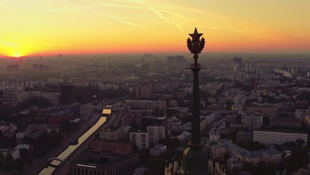 Drone view of the Moscow city with Stalin skyscraper. Sunrise in the city.