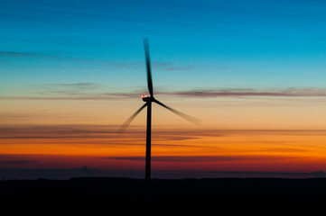 Fototapeta na wymiar wind turbine at sunrise