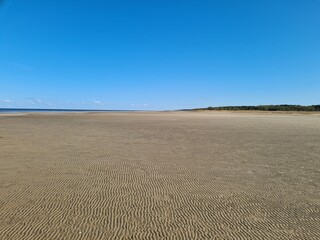 sand waves on the beach after ebb
