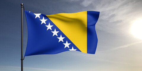 Bosnia and Herzegovina national flag cloth fabric waving on beautiful grey sky Background.