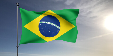 Brazil national flag cloth fabric waving on beautiful grey sky Background.