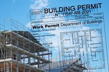 Buildings Permit project concept with residential building construction and metal scaffolding on a...