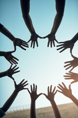 Group, circle and teamwork with open hands of people for support, community and help with bottom...