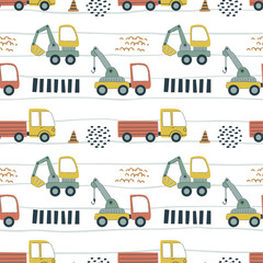 Cartoon vehicles vector seamless pattern. Cute kids ambulance, police car, school bus and truck isolated on white background.
 Hand drawn baby transport for textile