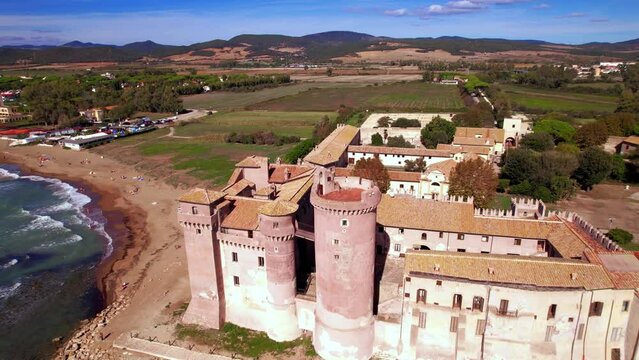  Italy. aerial scenic drone view of medieval castle on the beach of Ladispoli - Castello Palo Odescalchi. Lazio region