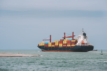 A ship loaded with containers at sea