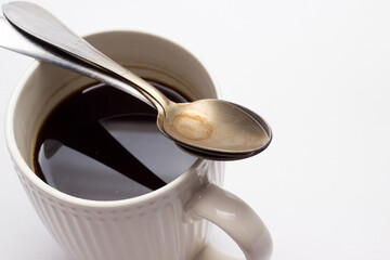 cup of coffee with spoon