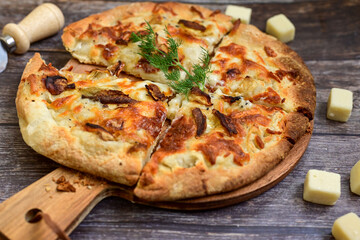 Tasty hot italian focaccia  pizza   with porcini mushroom,and cheese. Pizzeria menu. Concept poster for Restaurants or pizzerias. Top view