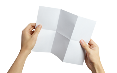 Hands holding a folded sheet of white paper, cut out