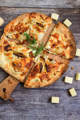 Tasty hot italian focaccia  pizza   with porcini mushroom,and cheese. Pizzeria menu. Concept poster for Restaurants or pizzerias. Top view