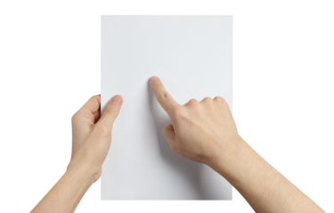 Hands holding and examining a sheet of paper, cut out