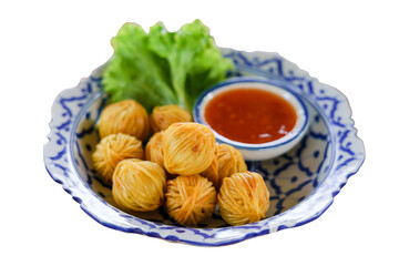 Moo Sarong Thai appetizer or Deep Fried Wrapped Pork with Chinese Noodle Serve with sweet red chilli sauce. Thai cuisine snacks menu in the palace.