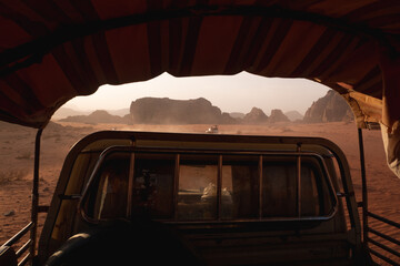 View from the back of a 4x4 vehicle in the Wadi Rum Desert.