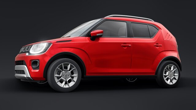 Tokio. Japan. September 11, 2022. Red Suzuki Ignis 2022 on a black background. Ultra-compact cheap city car for densely populated areas and heavy traffic. 3d rendering.