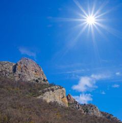 Fototapeta na wymiar mount slope in light of sparkle sun