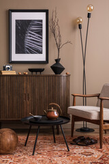 Stylish composition of living room interior with mock up poster frame, boucle armchair, round coffee table, wooden sideboard, stylish lamp and personal accessories. Home decor. Template.