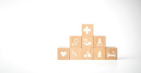 Obraz premium Concept of Insurance for your health with wooden block and icon healthcare medical on white background
