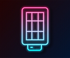 Glowing neon line Studio light bulb in softbox icon isolated on black background. Shadow reflection design. Vector