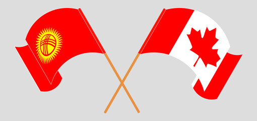 Crossed and waving flags of Kyrgyzstan and Canada