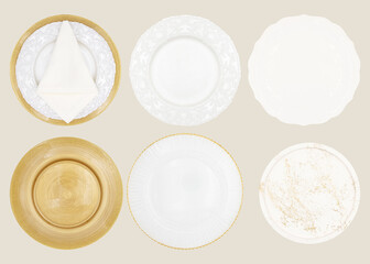 Set of different plates on beige background