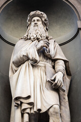 Leonardo da Vinci - Statue of the genius, located in front of Uffizi Gallery in Florence, Italy, in...