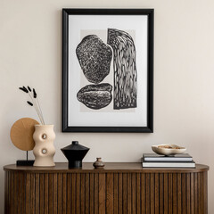 Domestic and cozy interior of living room with mock up poster frame, wooden commode, vase with...