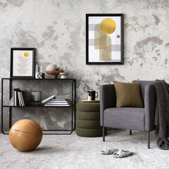 Loft style of modern apartment with grey armchair, black design shelf, mock up poster frame, decoration, carpet, lamp and personal accessories. Minimalist home decor. Template. Grunge concrete wall.