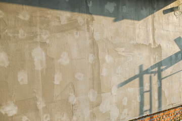 House insulation concept. Facade insulation with mineral wool, thermal improvement and energy saving. Modern farmhouse renovation, stone wool covered with plaster