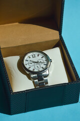 a wristwatch, a stylish accessory. business lifestyle. background for the design. measuring time