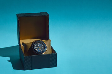 a wristwatch, a stylish accessory. business lifestyle. background for the design. measuring time